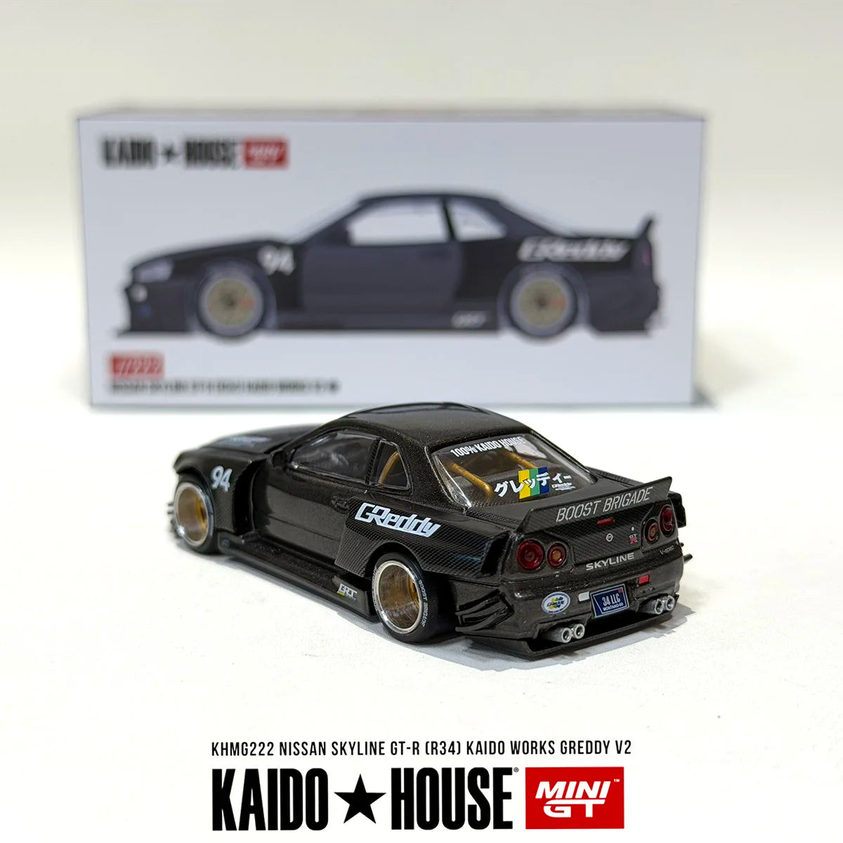 Mini GT x Kaido House 1:64 Nissan Skyline GT-R R34 Kaido Works Greddy V2 Full Carbon Diecast Car Model Item#KHMG222 In Stock