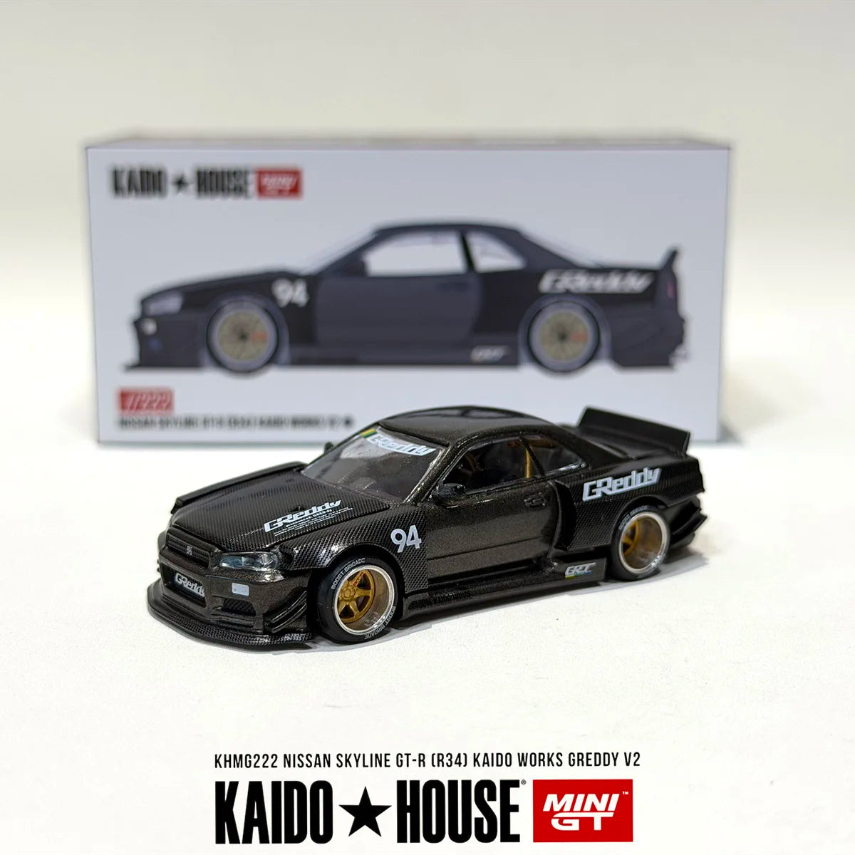 Mini GT x Kaido House 1:64 Nissan Skyline GT-R R34 Kaido Works Greddy V2 Full Carbon Diecast Car Model Item#KHMG222 In Stock