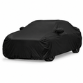 Blank black car cover fitted over a vehicle on a white background