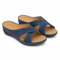 Blue cross-strap wedge sandal hero
