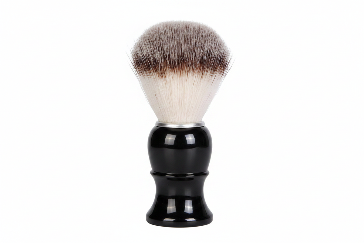 Complete wet shave kit shaving brush with black handle on white background