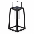 Black metal solar lantern with square frame, top handle, solar panel and white cylindrical light on a white background