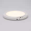 Rechargeable LED motion sensor ceiling light, slim white round design with sensor controls and USB-C port, glowing soft white against a grey background